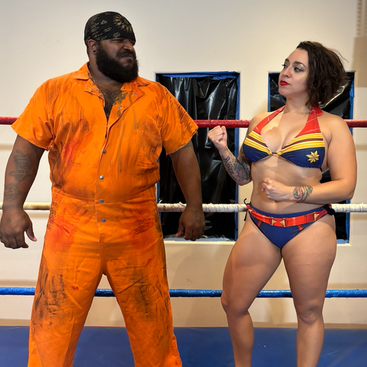 Maledom Match: Captain Marvel Faces Beefy Prisoner